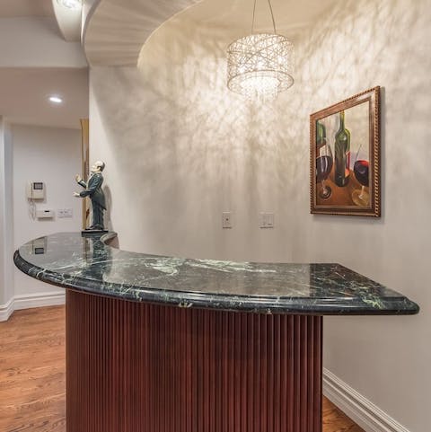 Serve up drinks at the bar