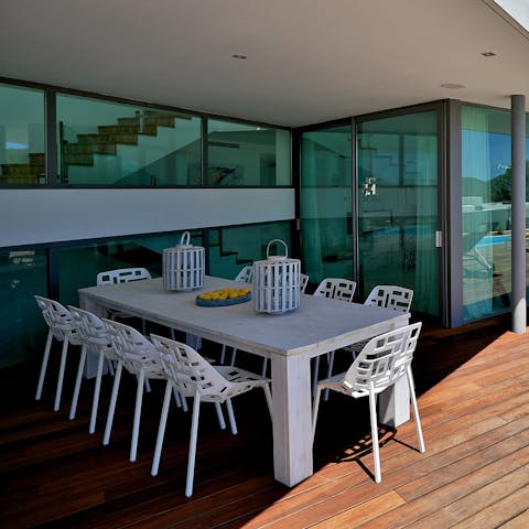 Tuck into delicious Spanish pinchos around the shaded dining set