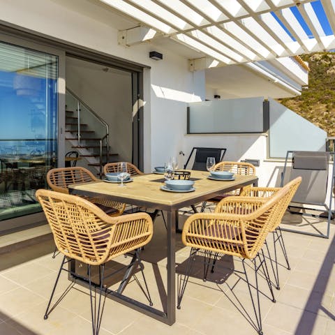 Sit down to a traditional Spanish breakfast on the private balcony