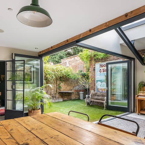 Fold back the doors and enjoy seamless indoor-outdoor living