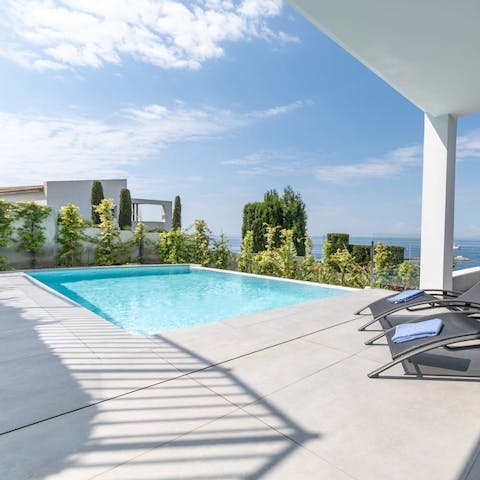 Relax on a lounger or float about in your private pool