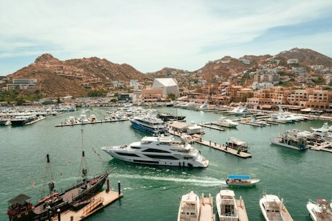 Explore Marina Cabo San Lucas's waterfront lined with yachts and restaurants, just fifteen minutes on foot