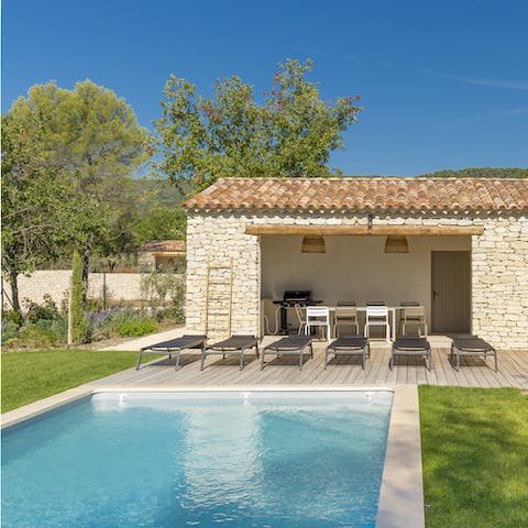 Laze the day away by the poolside and enjoy lunch from the summer kitchen
