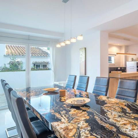 Share traditional tapas with your loved ones around this delightful dining table