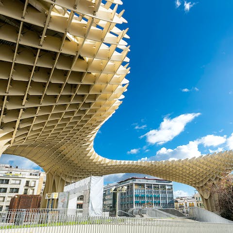 Stay right beside the Mushrooms of Seville, an icon of the city