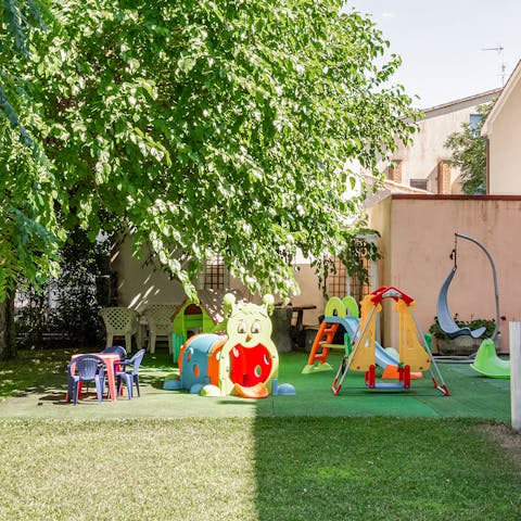 Let the kids entertain themselves at the shared garden's playpark