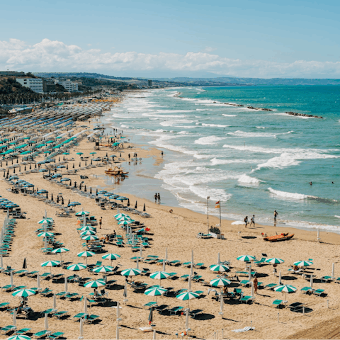 Walk to Marina di Grosseto's soft-sanded beach, 300 metres away