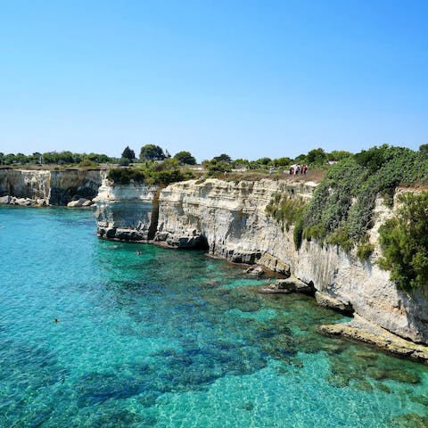 Head to the calm turquoise water of the Specchiolla coast, just a short drive away