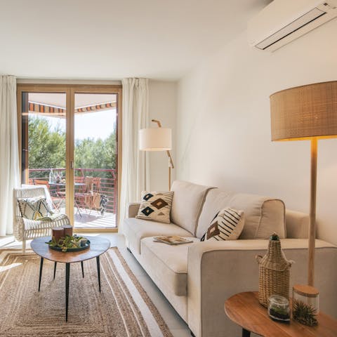 Look forward to relaxing in the boho-chic living space with a glass of wine in hand