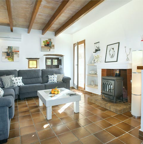 Relax in the rustic living room after a day spent exploring Pollensa