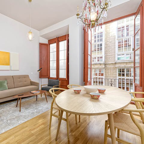 Open the balcony doors to feel like you're dining alfresco on the cute, circular table