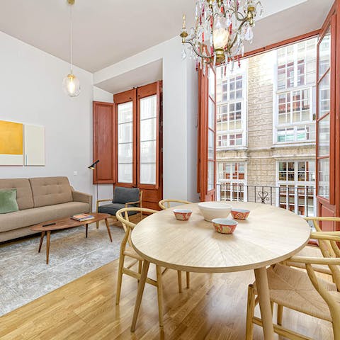 Open the balcony doors to feel like you're dining alfresco on the cute, circular table