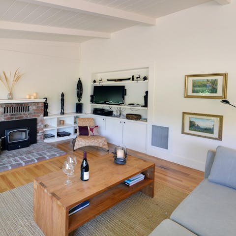 Kick  back and enjoy a glass of wine in the charming living room
