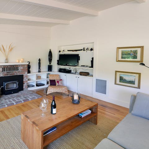 Kick back and enjoy a glass of wine in the charming living room