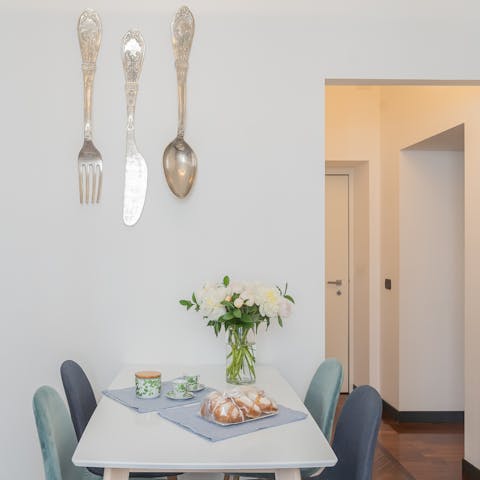 Relish some fragole con gelato under the giant cutlery
