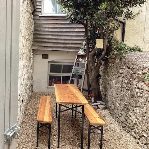 Gather in the small courtyard for sundowners