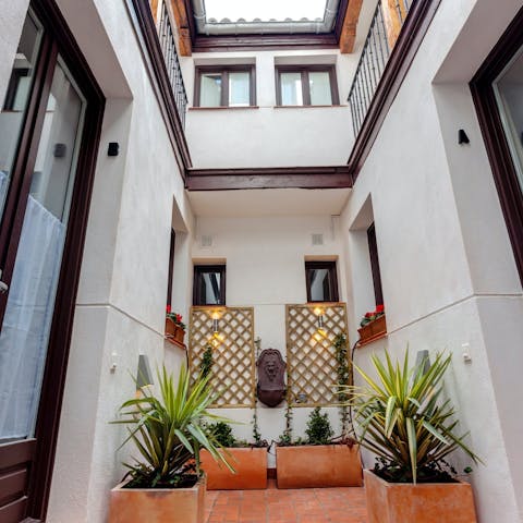 Get some fresh air in the shared courtyard