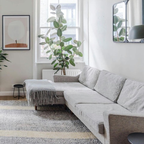 Unwind in the sun-lit living space after a busy day of sightseeing