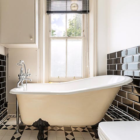 Recline after a long day in the roll top bathtub