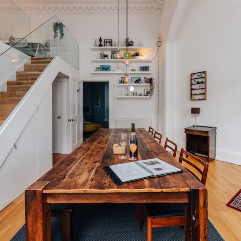 Gather together for celebratory meals at the long wooden dining table