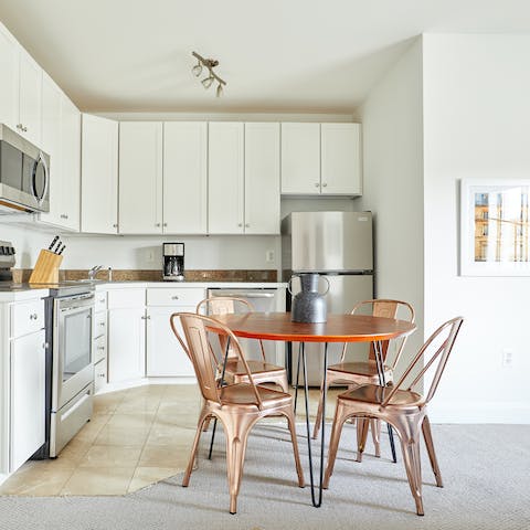 Enjoy a homecooked meal around the dining table, or make it your office for the day and work remotely