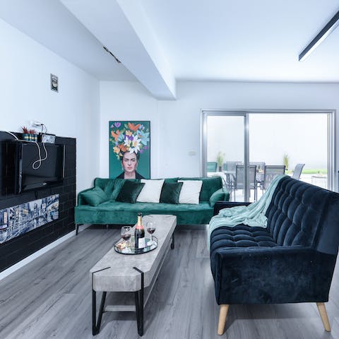 Get cosy on the velvet sofas in the lounge and settle in for movie night