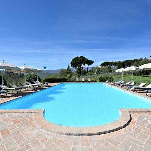 Swim a few lengths of the heated private pool or get competitive on the tennis court