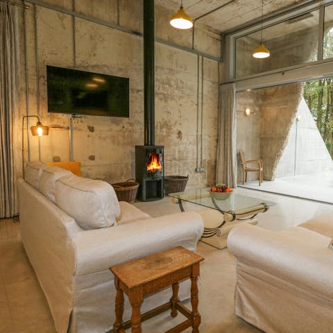 Curl up on the sofa while a roaring fire warms you up