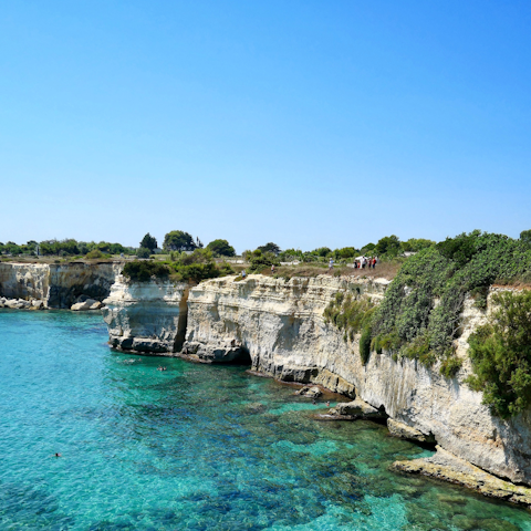 Swim in the sea at Grotta Grande del Ciolo – it's a short drive away