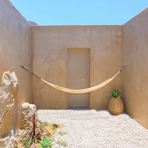 Relax in the hammock in the peaceful courtyard