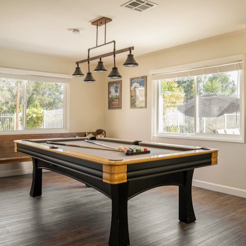 Get competitive and get a pool tournament going among guests