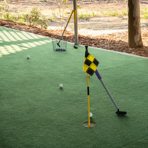 Hone your swing in the practice putting range