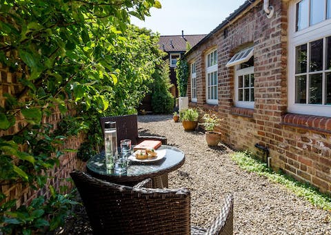 Enjoy your morning coffee in the front courtyard garden