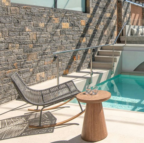 Dip your feet in the pool as you soak up the sun