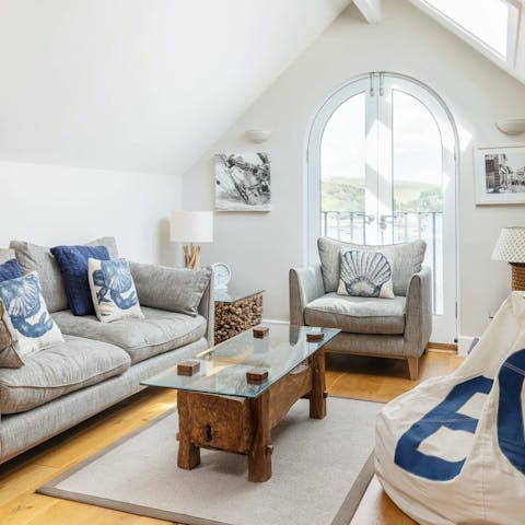 Recline amid the driftwood furnishings and lofty ceilings of the lounge