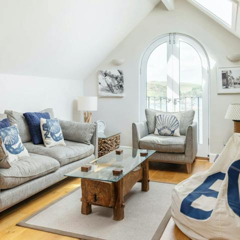 Recline amid the driftwood furnishings and lofty ceilings of the lounge