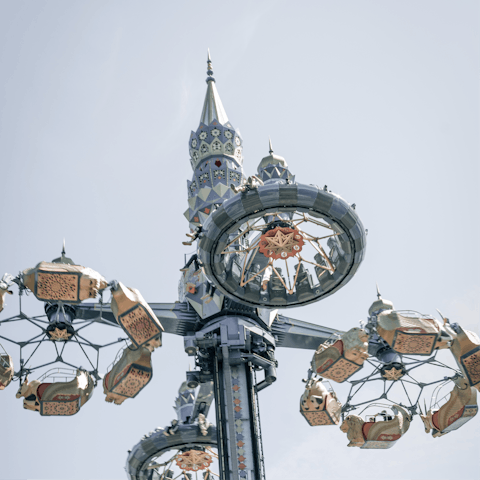 Start you sightseeing at the iconic Tivoli Gardens