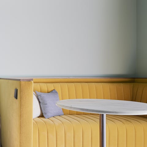 Cosy up on the booth-style sofa