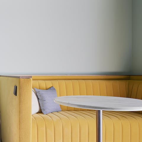 Cosy up on the booth-style sofa