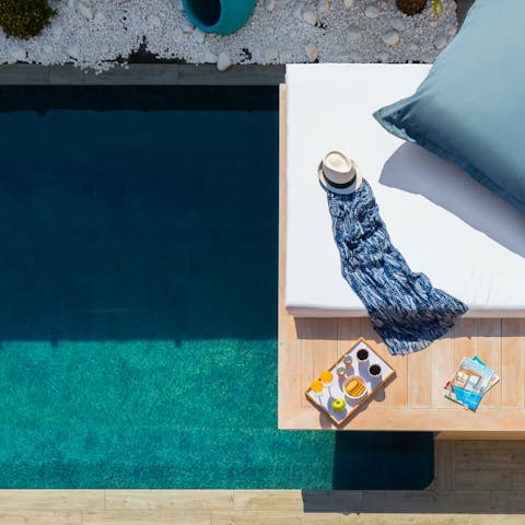 Spend serene days stretched out by the pool