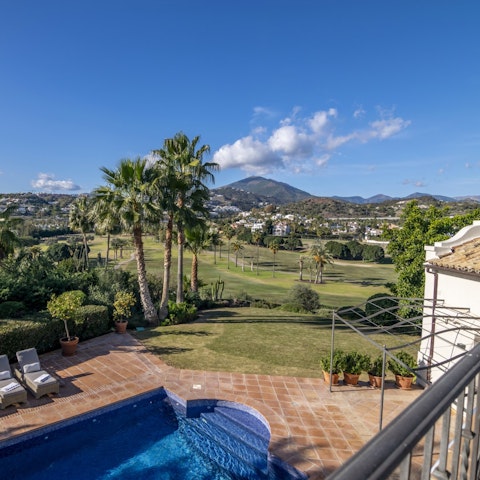 Enjoy scenic views of the nearby golf course