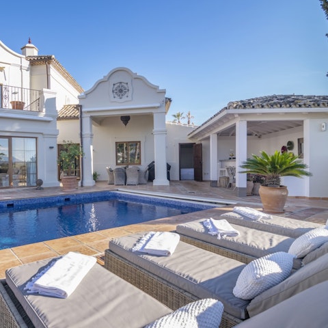 Swim, sunbathe, and share alfresco meals on the terrace