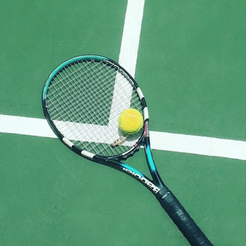 Play a game of tennis on the resort's shared courts