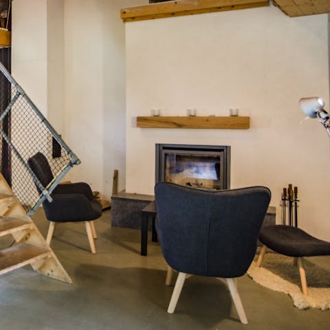 Cosy up around the wood burner fire, after a day of discovering the local hiking routes