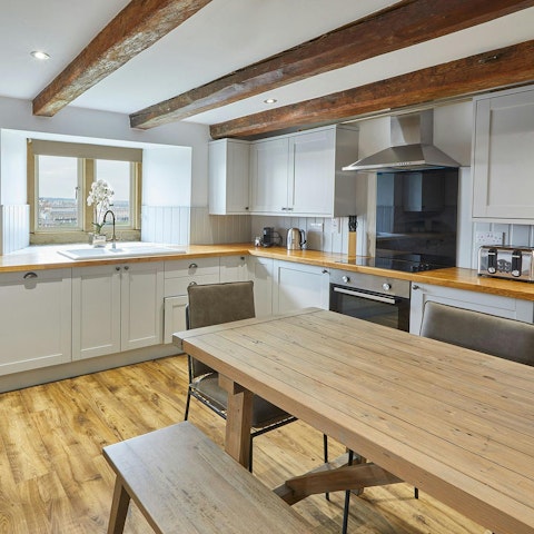 Dine in the kitchen with views of the harbour