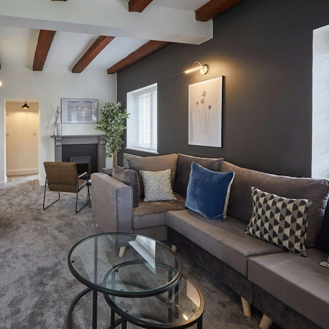 Spend cosy evenings unwinding in the living room