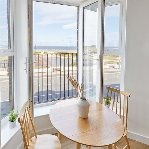 Enjoy a full English breakfast while looking out at the seascape