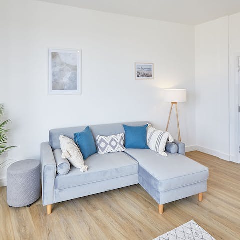 Stretch out in the living area after a leisurely coastal walk to
