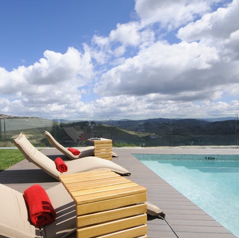 Dip in the infinity pool by the hills