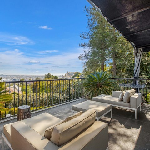 Enjoy sweeping views over Los Angeles from the patio